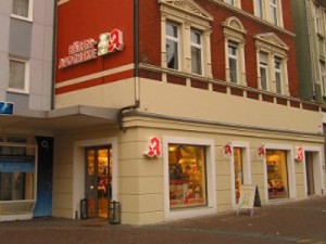 Umbau und Erweiterung eines Wohn- und Geschäftshauses
